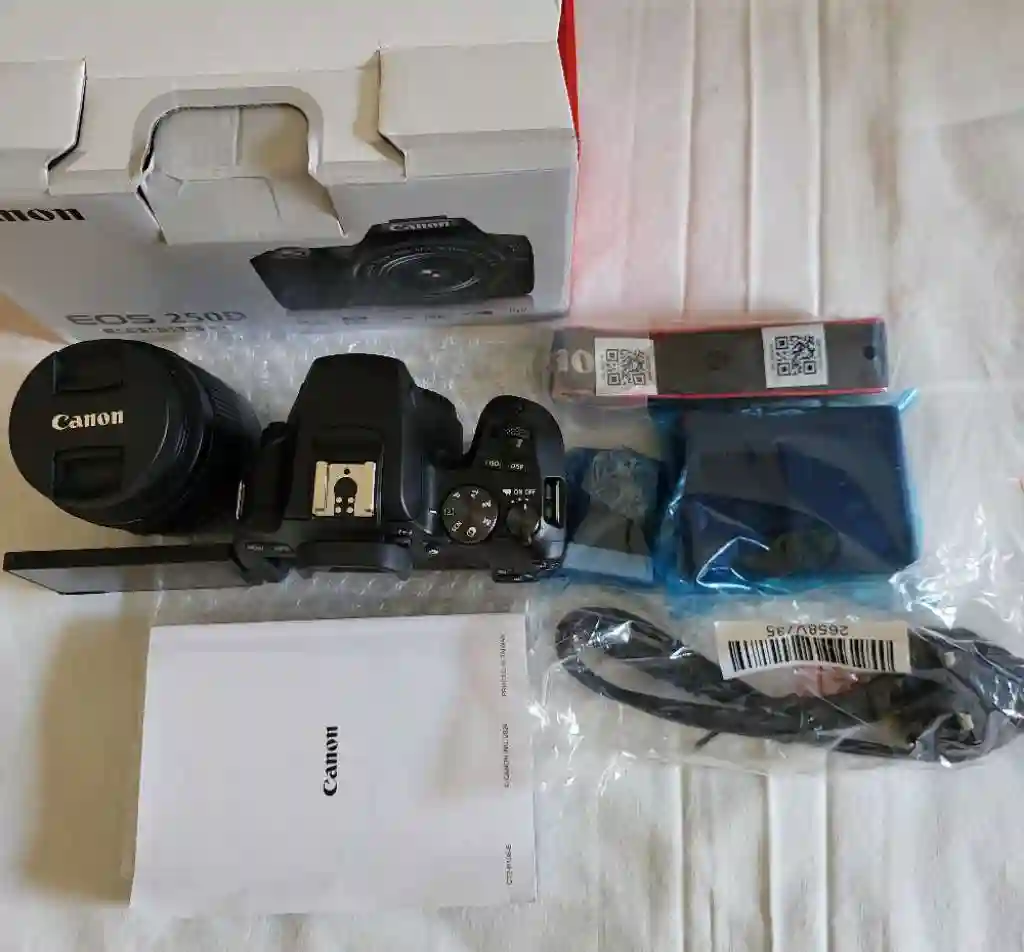 Canon EOS 250d Cacheté et Tripod Hama 63 - Vue 2
