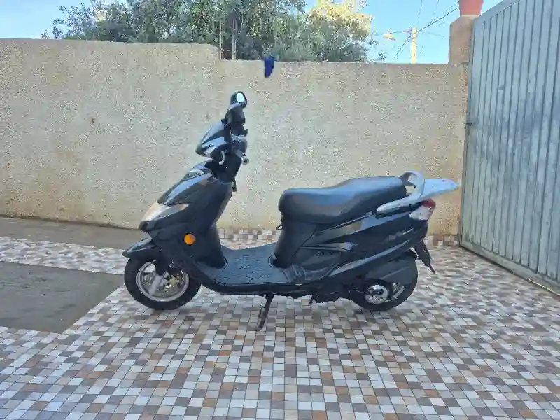 Suzuki An125 - Vue 1