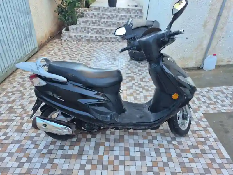 Suzuki An125 - Vue 4