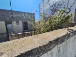 À Vendre Terrain de 456 m² Avec Titre Foncier sur Route Princi